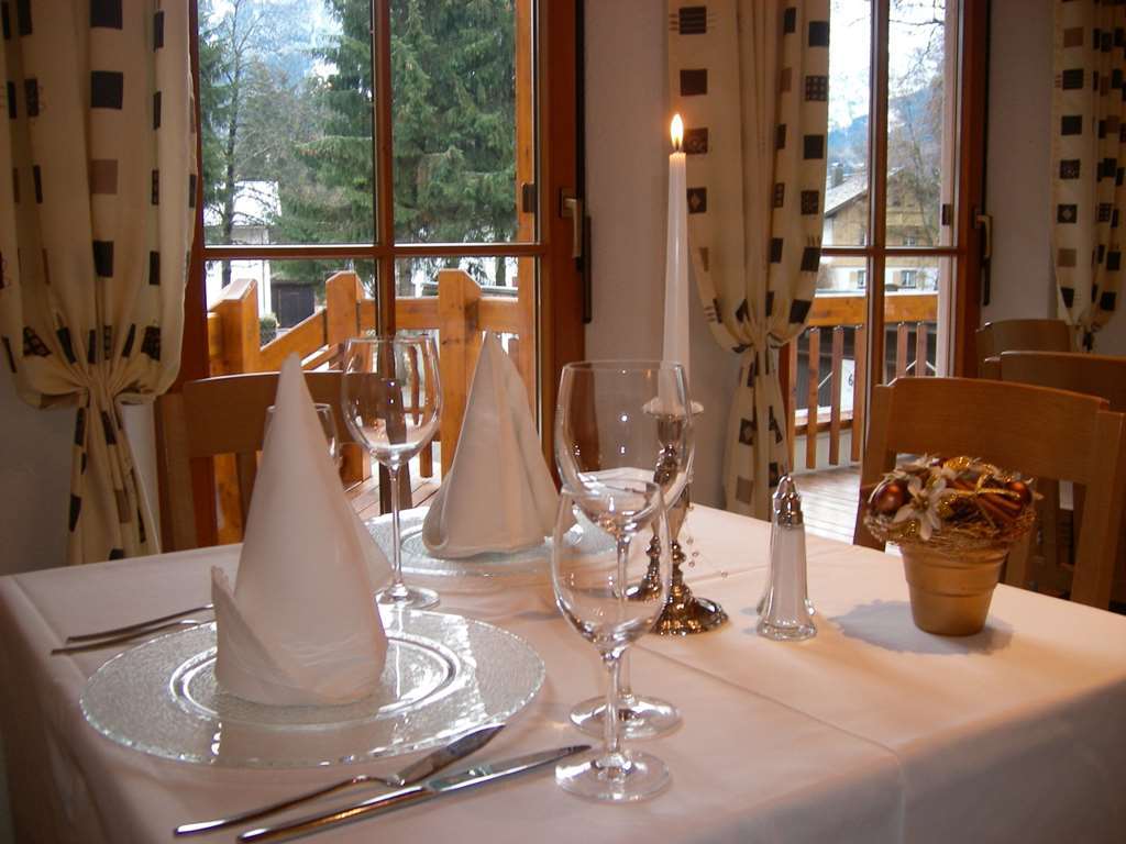 Hotel Und Apartements Im Forellenbach Fischen im Allgaeu Restaurant bilde